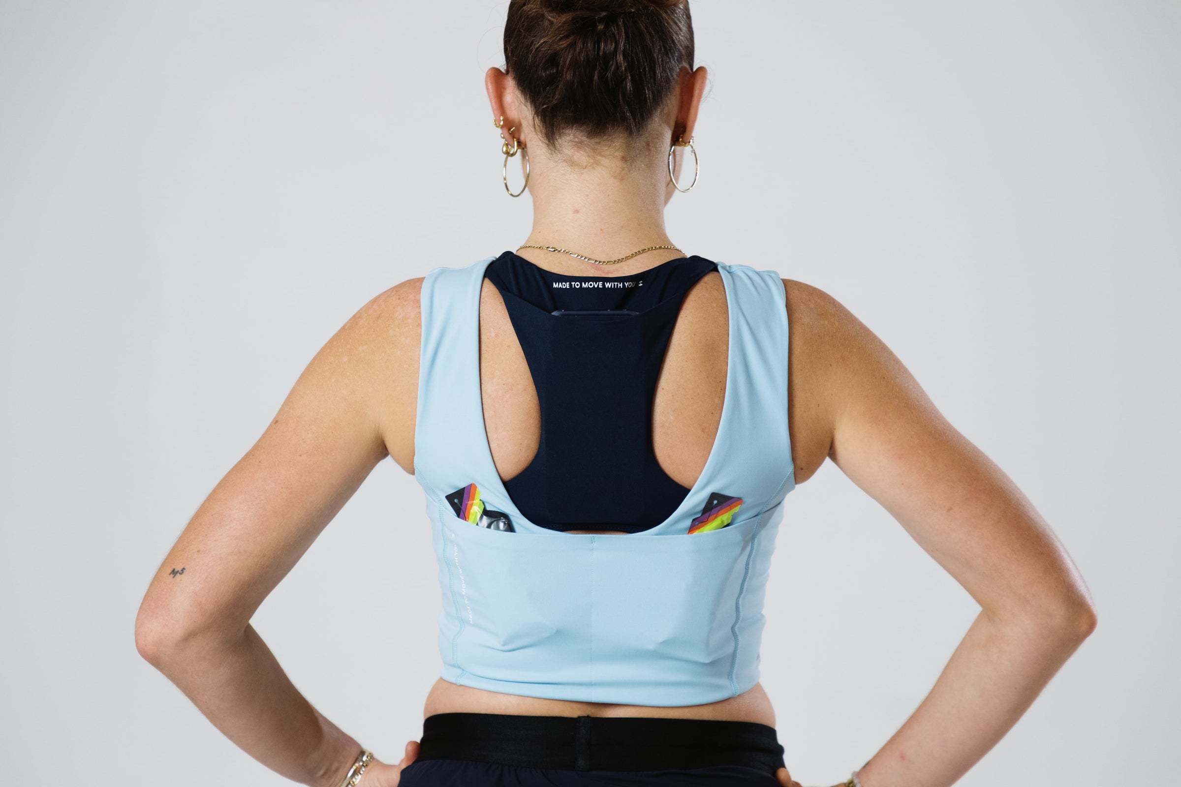 SASH Baby Blue Support Vest, rear fit and storage detail