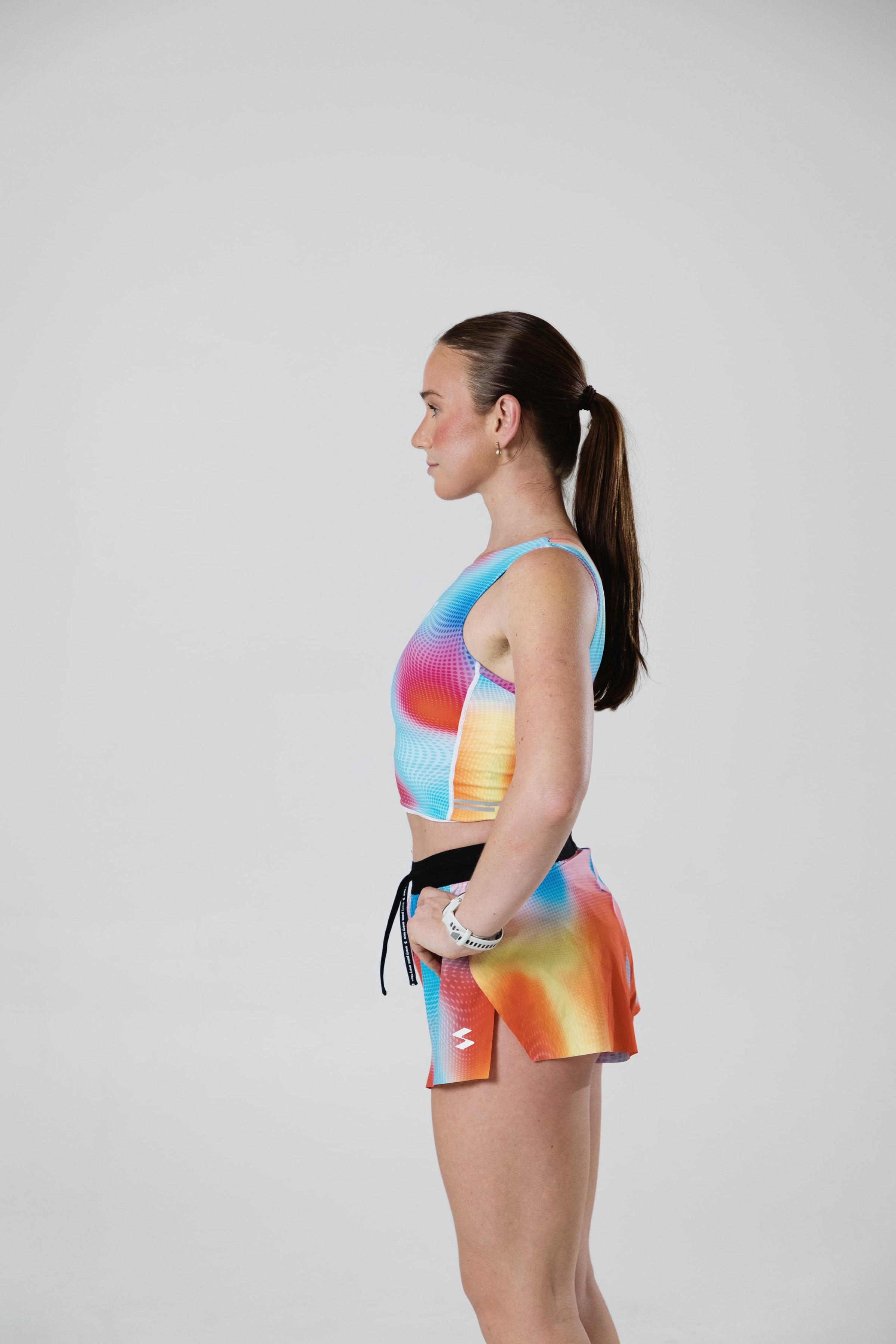 Runner wearing the SASH Flow State Print Free Short, side view