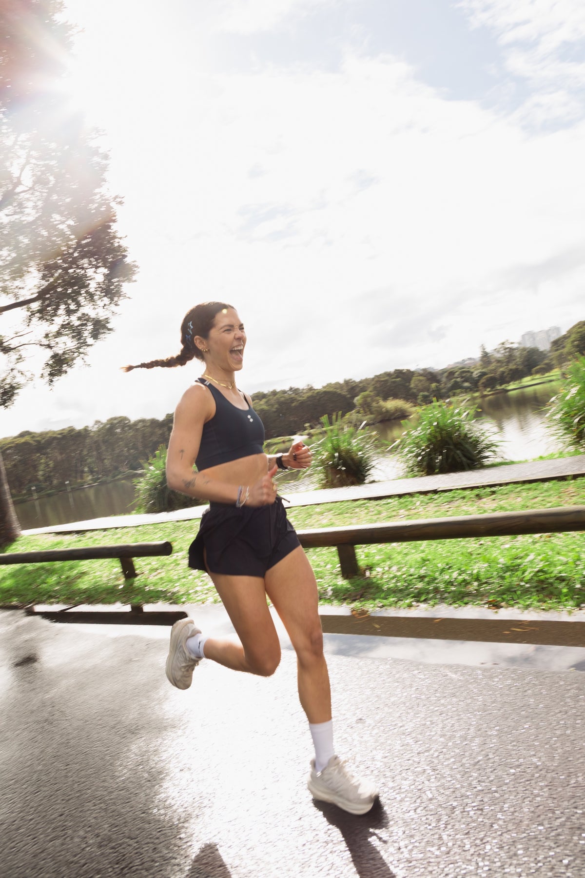 sash ACTIVE co-founder Sissi running beside the lake